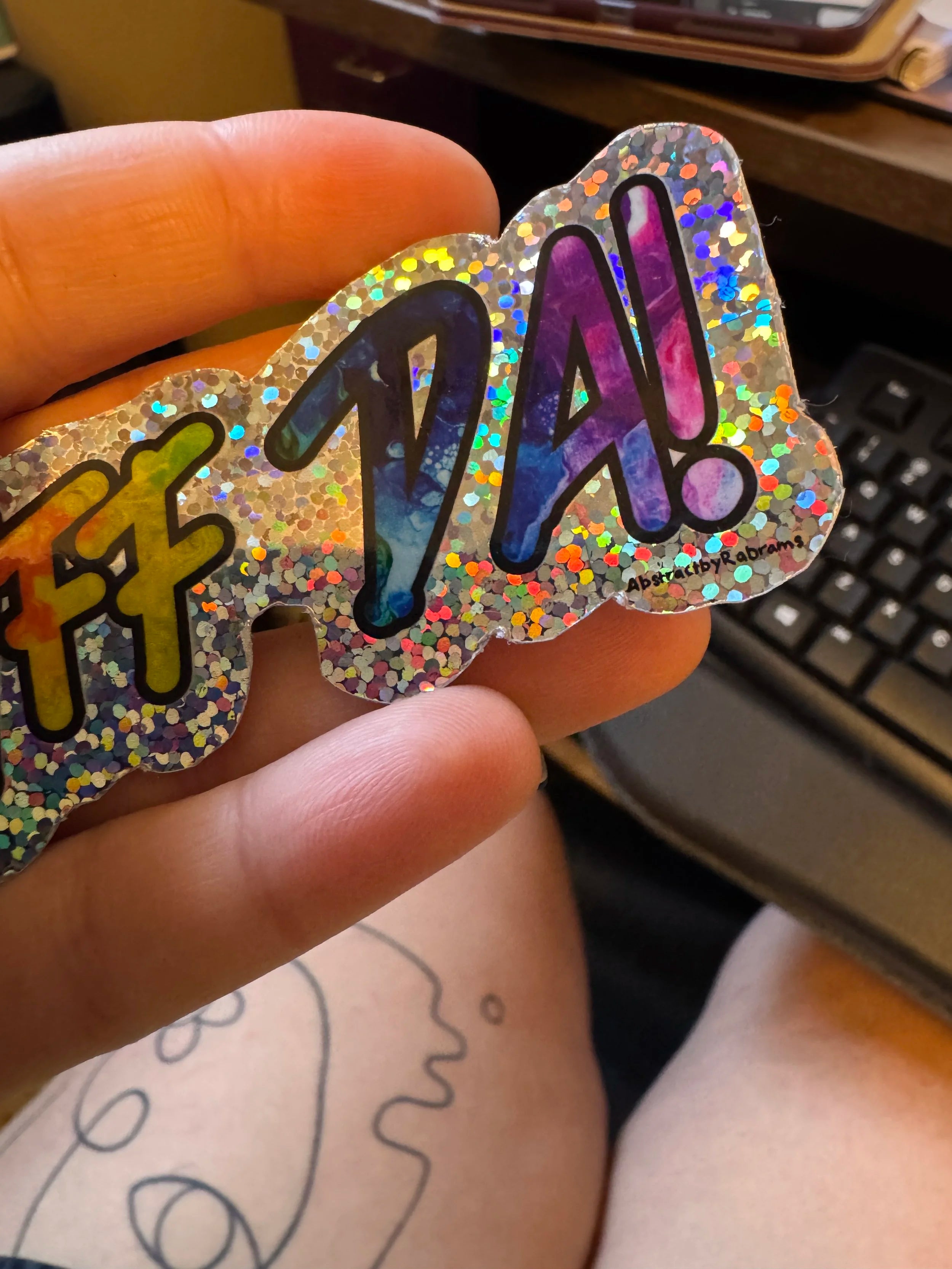 B-Grade Rainbow Glittery Uff Da Glossy Sticker