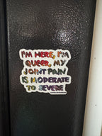 I'm Here, I'm Queer, My Joint Pain is Moderate to Severe Rainbow Fridge Magnet